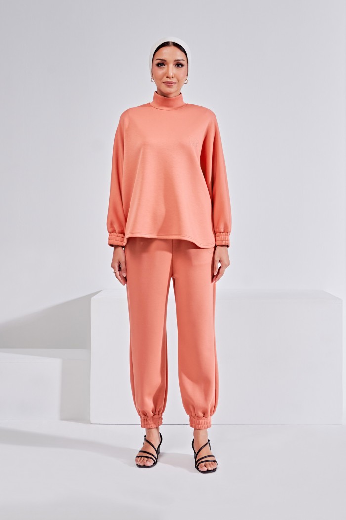 Ae-Ra Set (Jogger Pants)  In Peach Salmon